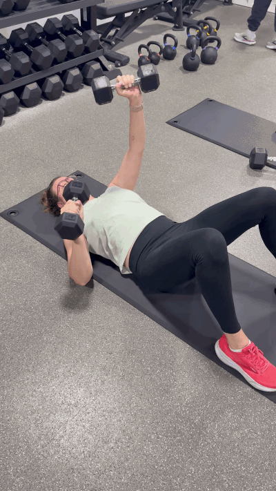 giphy video of Allea working out with dumbbells 