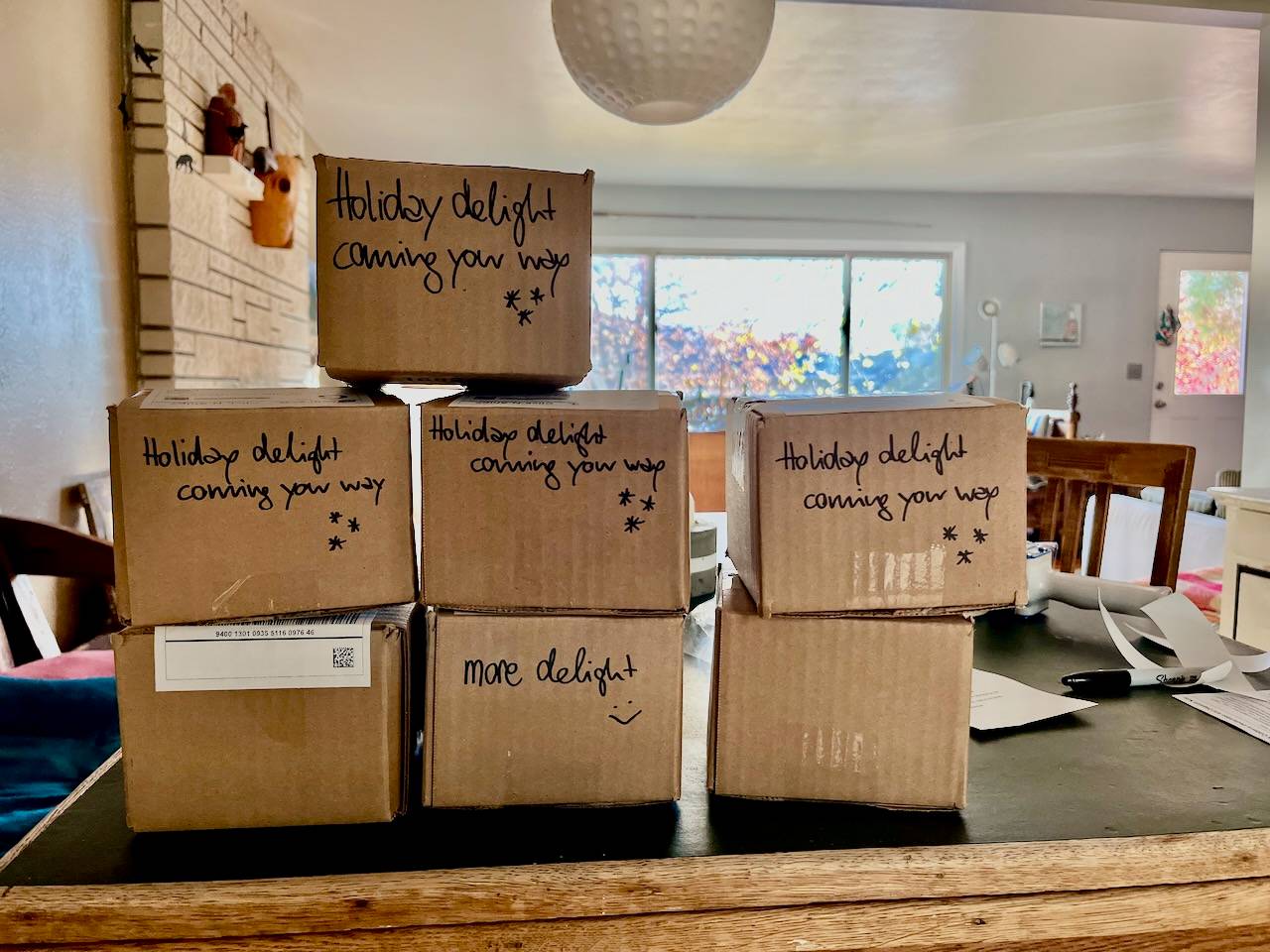 stack of boxes on my dining room table