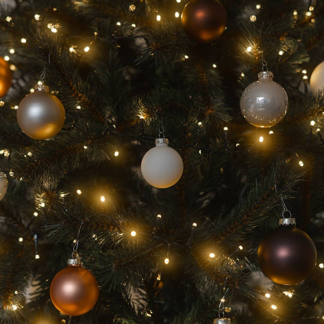 Close-up of a decorated christmas tree with lights.