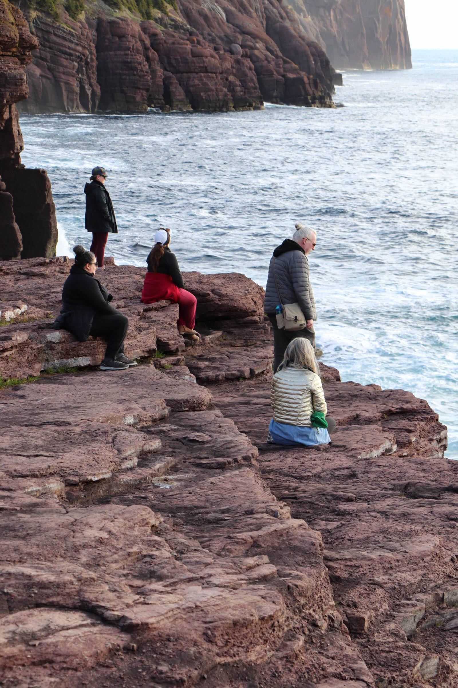 Image of retreat participants on the edge of the sea in Flatrock, NL