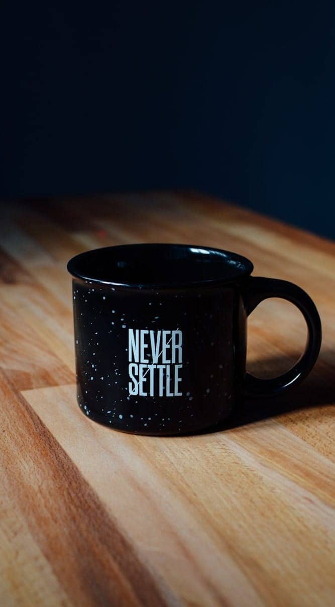black ceramic mug on table