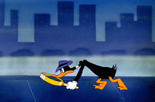 A gif of daffy duck searching with a magnifying glass.