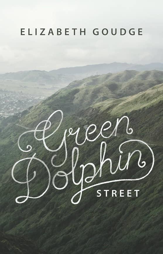 Green verdant hills and fog with book title Green Dolphin Street