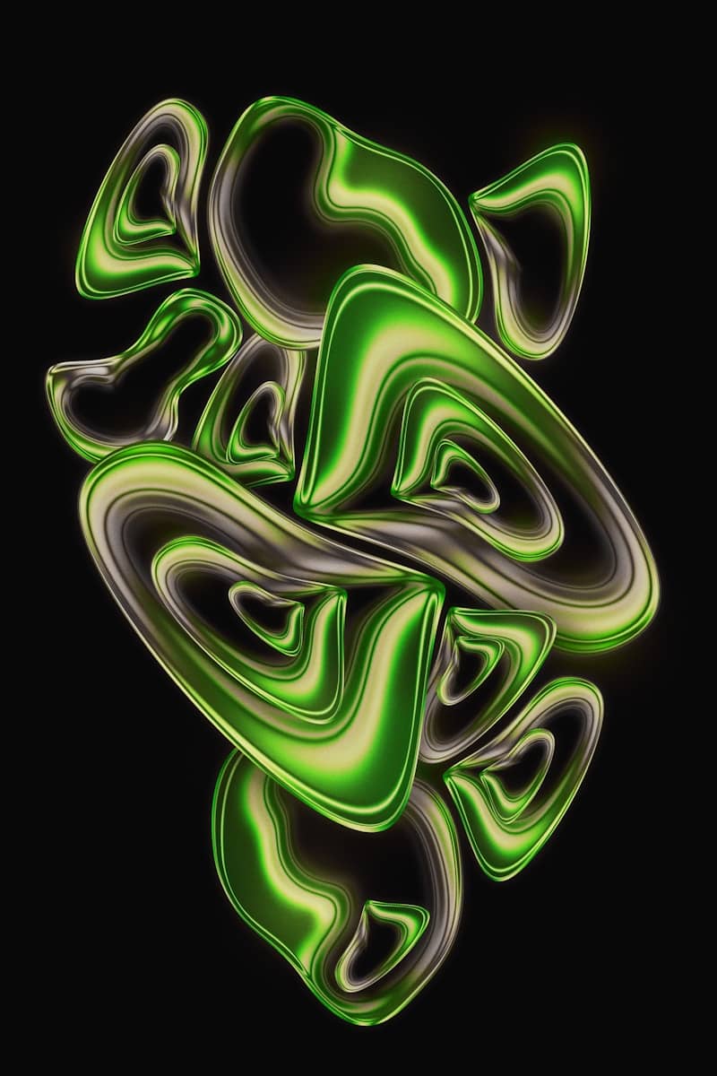 Abstract green shapes with metallic sheen on black