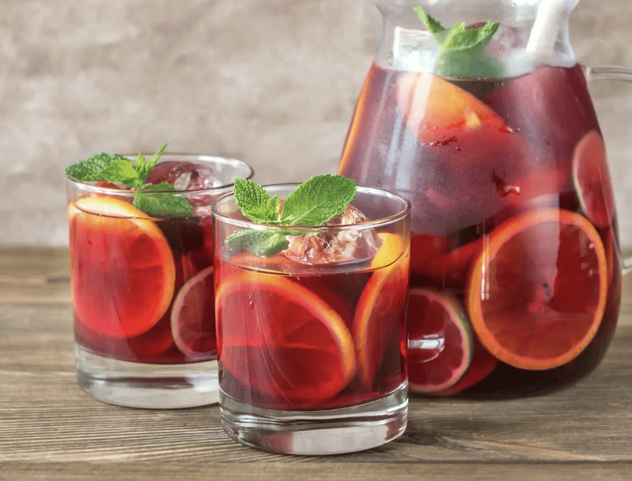 Bottles of sangria with lemon slices.