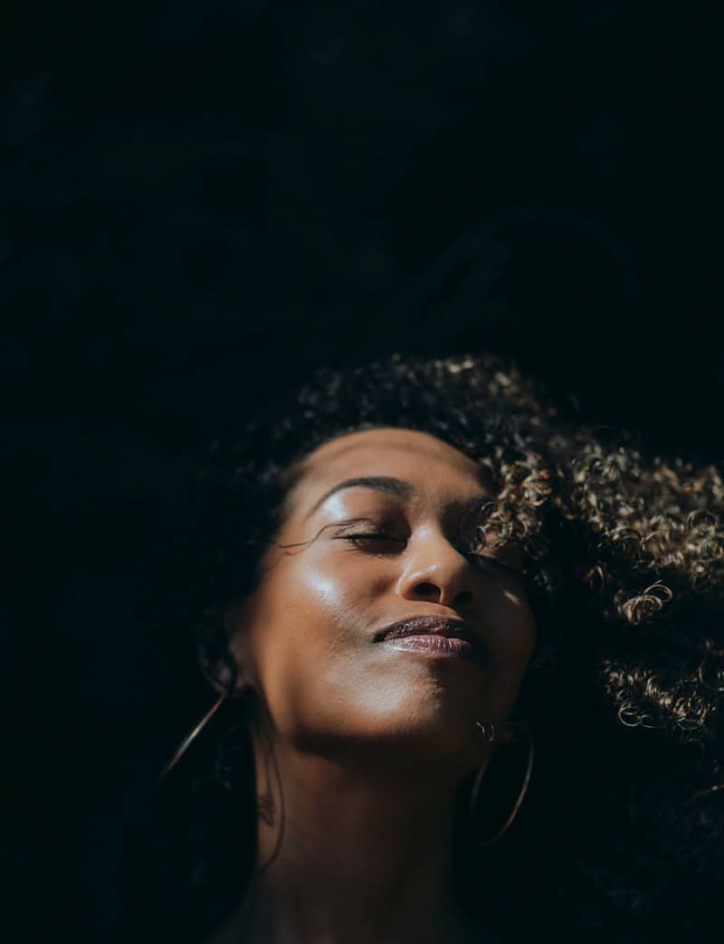 woman with brown curly hair