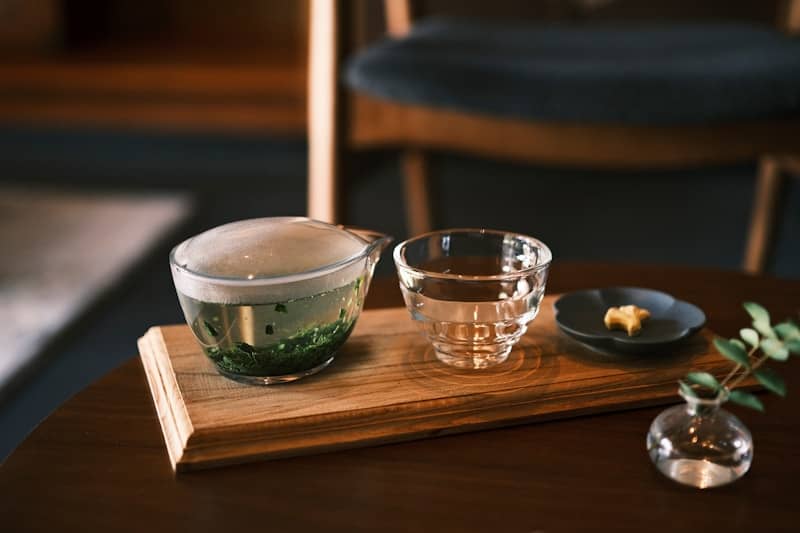 Tea set with teapot, teacup, and small dish.
