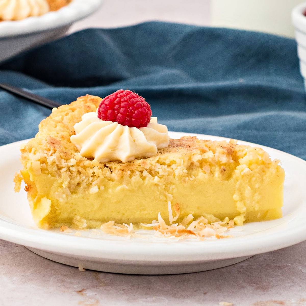 White plate of coconut custard pie.