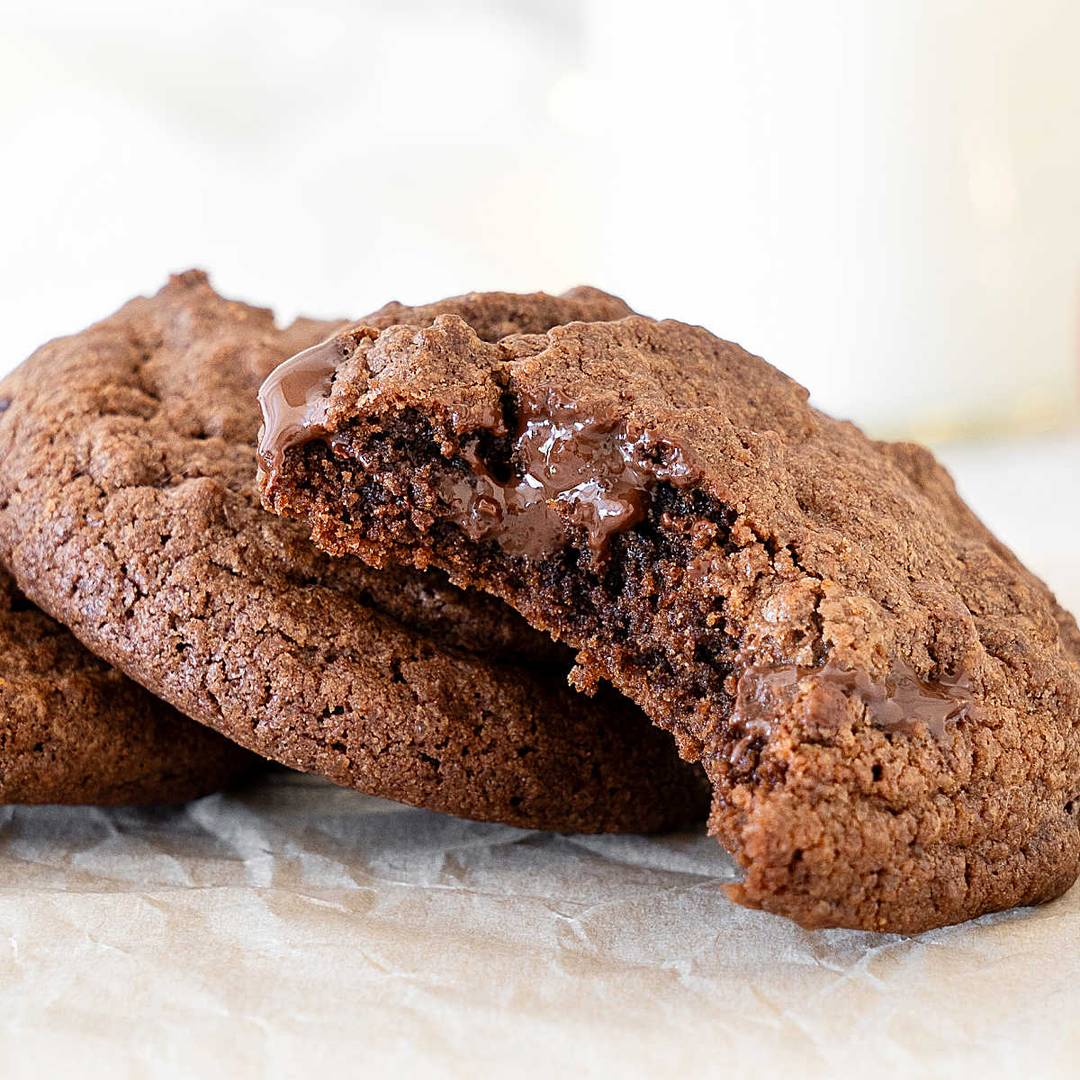 Bitten and whole chocolate cookies.