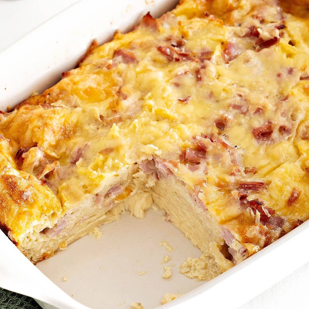 White dish of savory bread pudding.