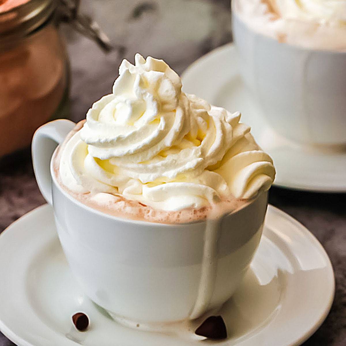 White cup with whipped cream.