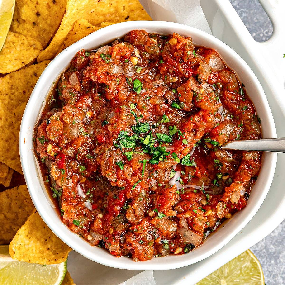 White bowl of salsa ranchera.