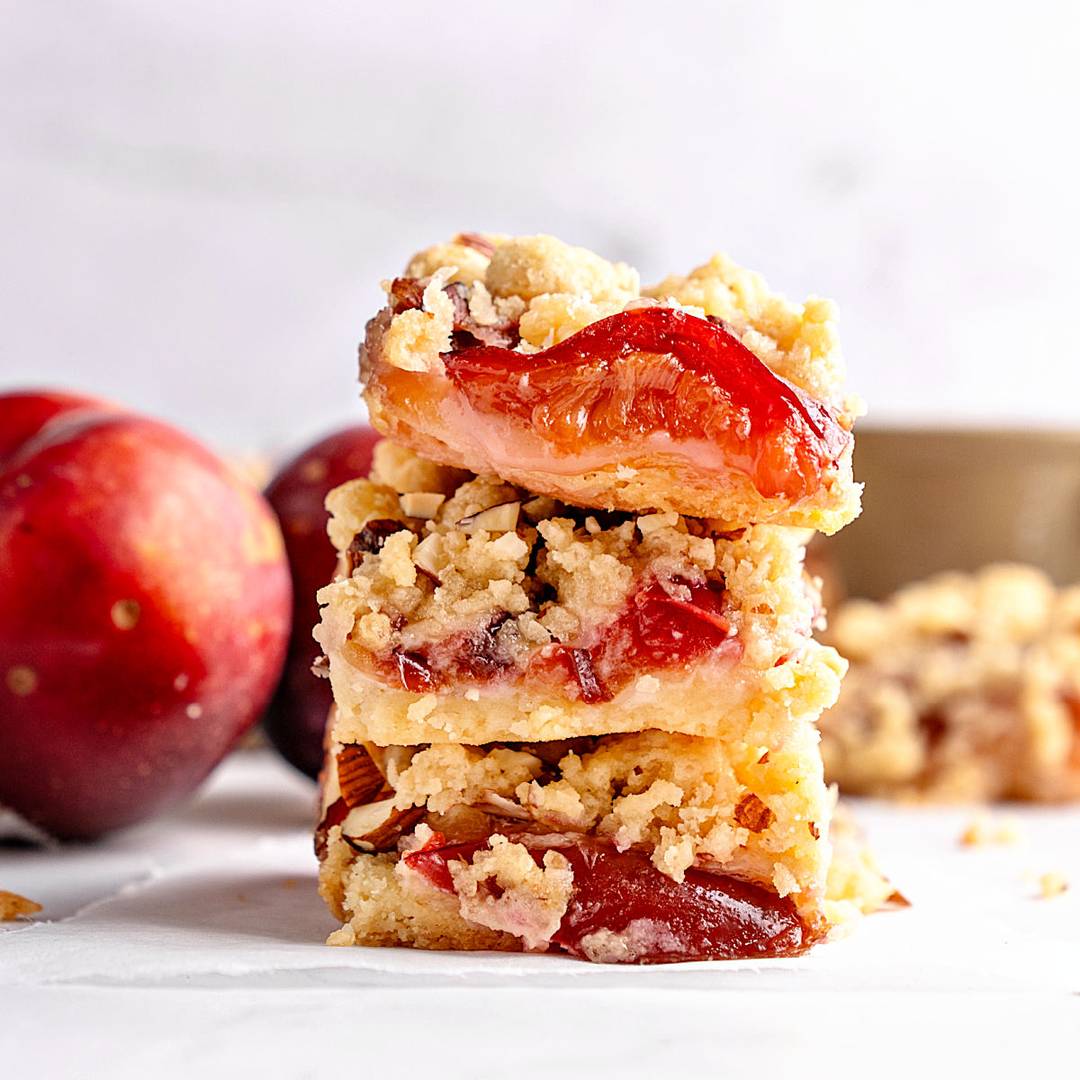 Stack of plum crumble bars. 