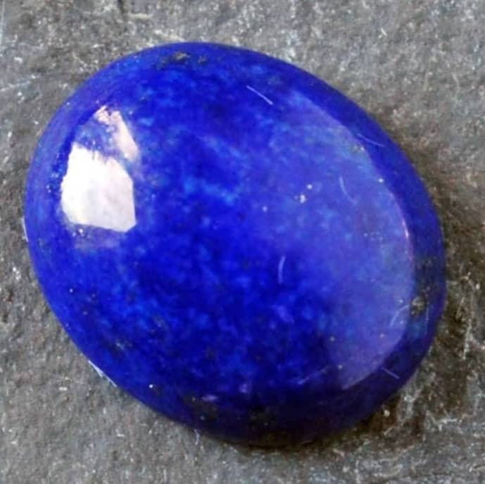 Lapis Lazuli cabochon that has likely been dyed