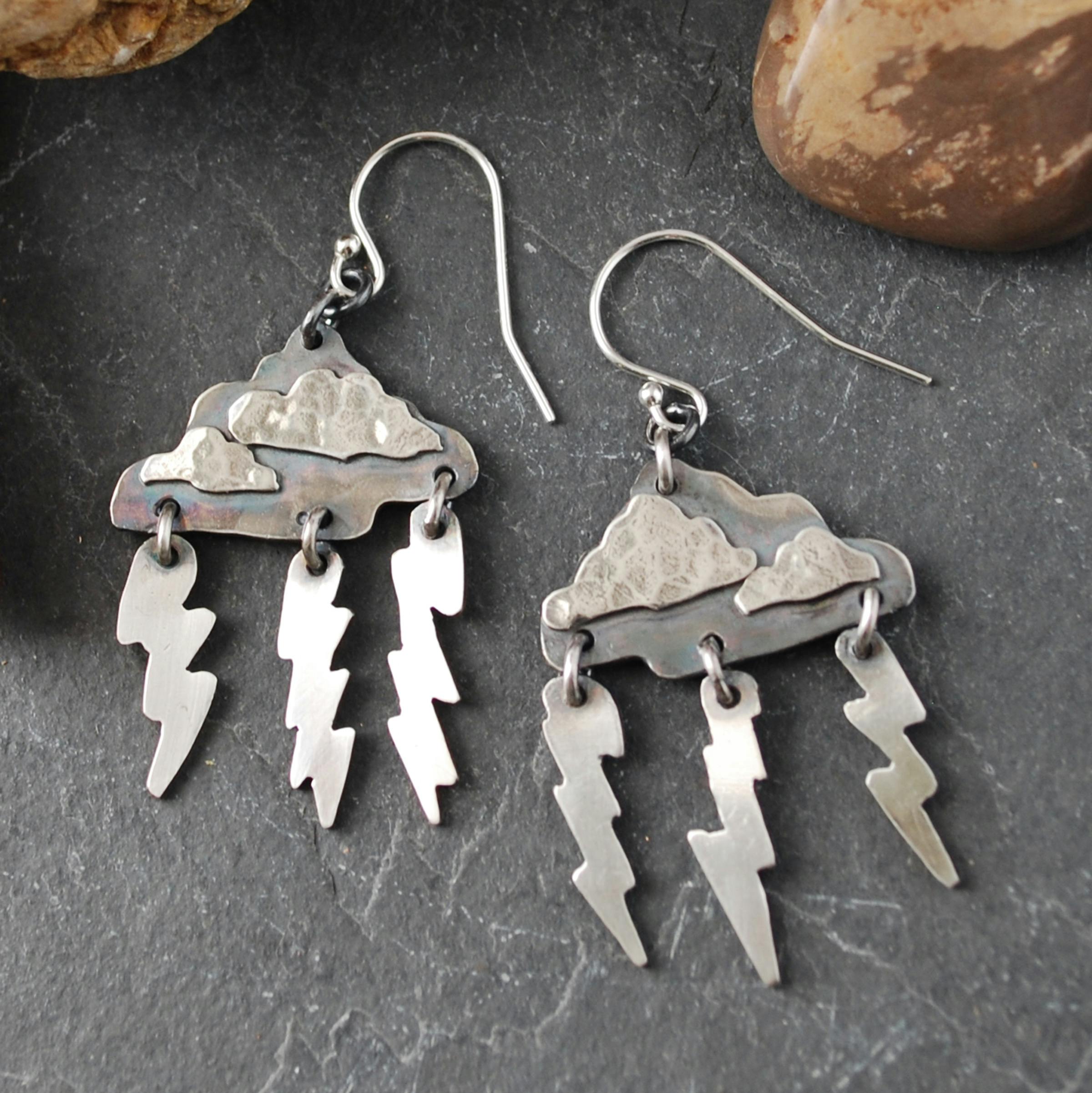 Silver cloud earrings with dangling lightning bolts