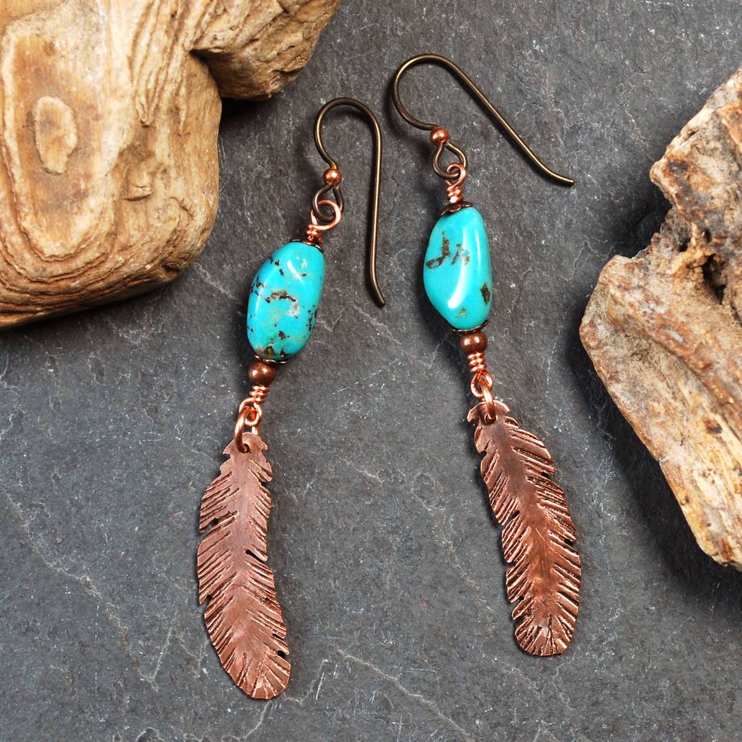 Earrings with turquoise nuggets and copper feathers