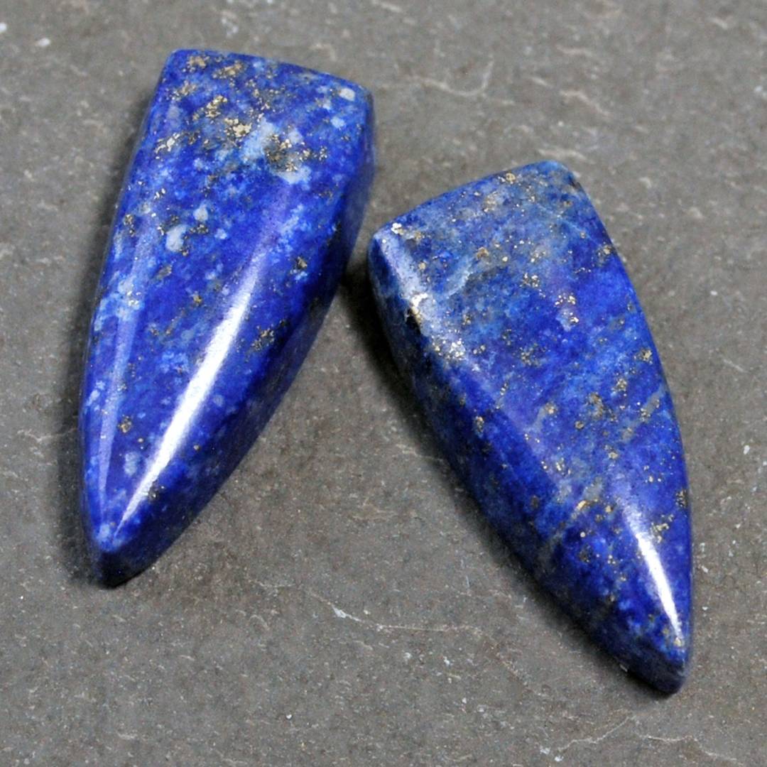two lapis lazuli cabochons with pyrite flecks