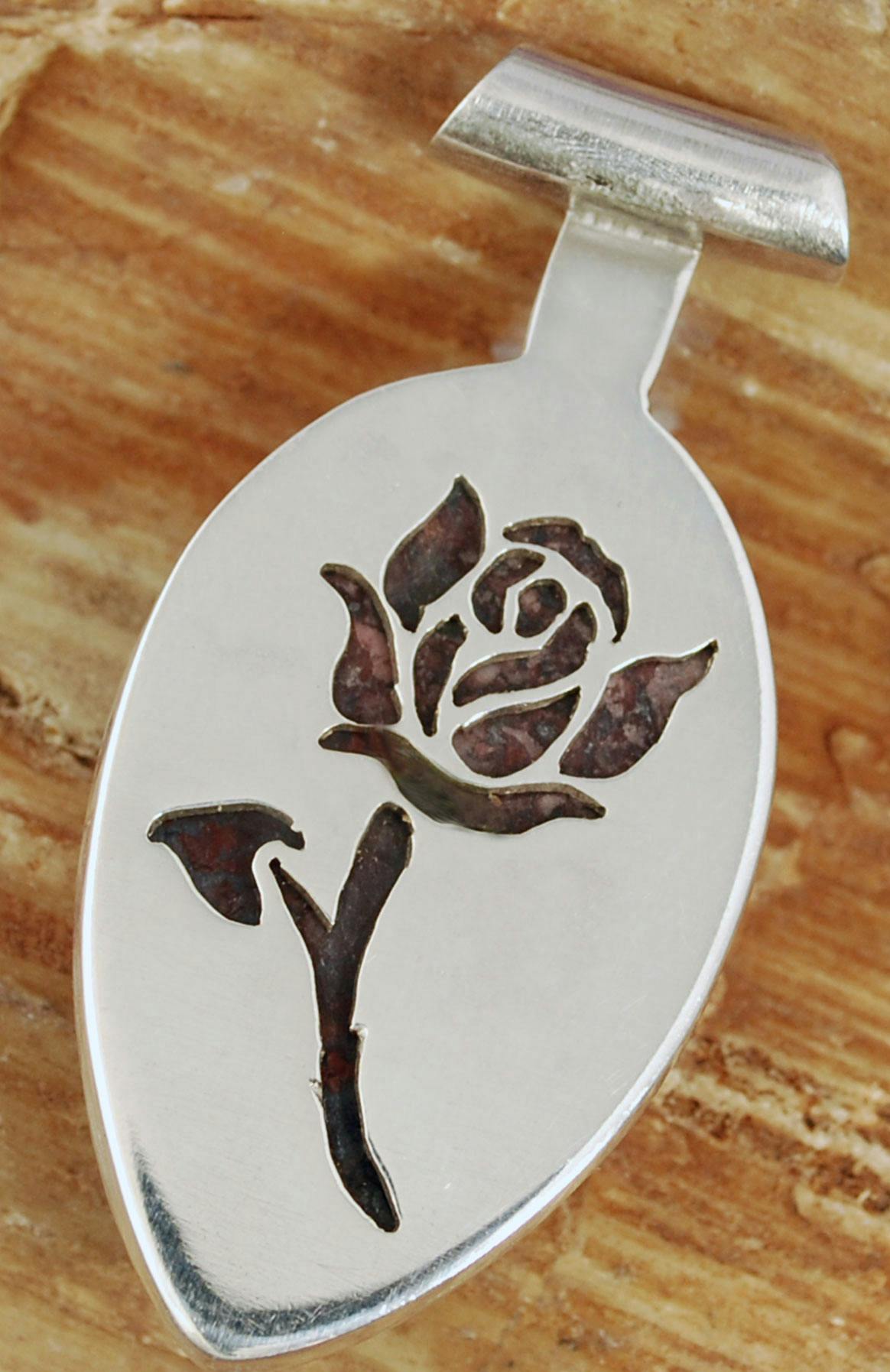 Back of pendant cut out of rose