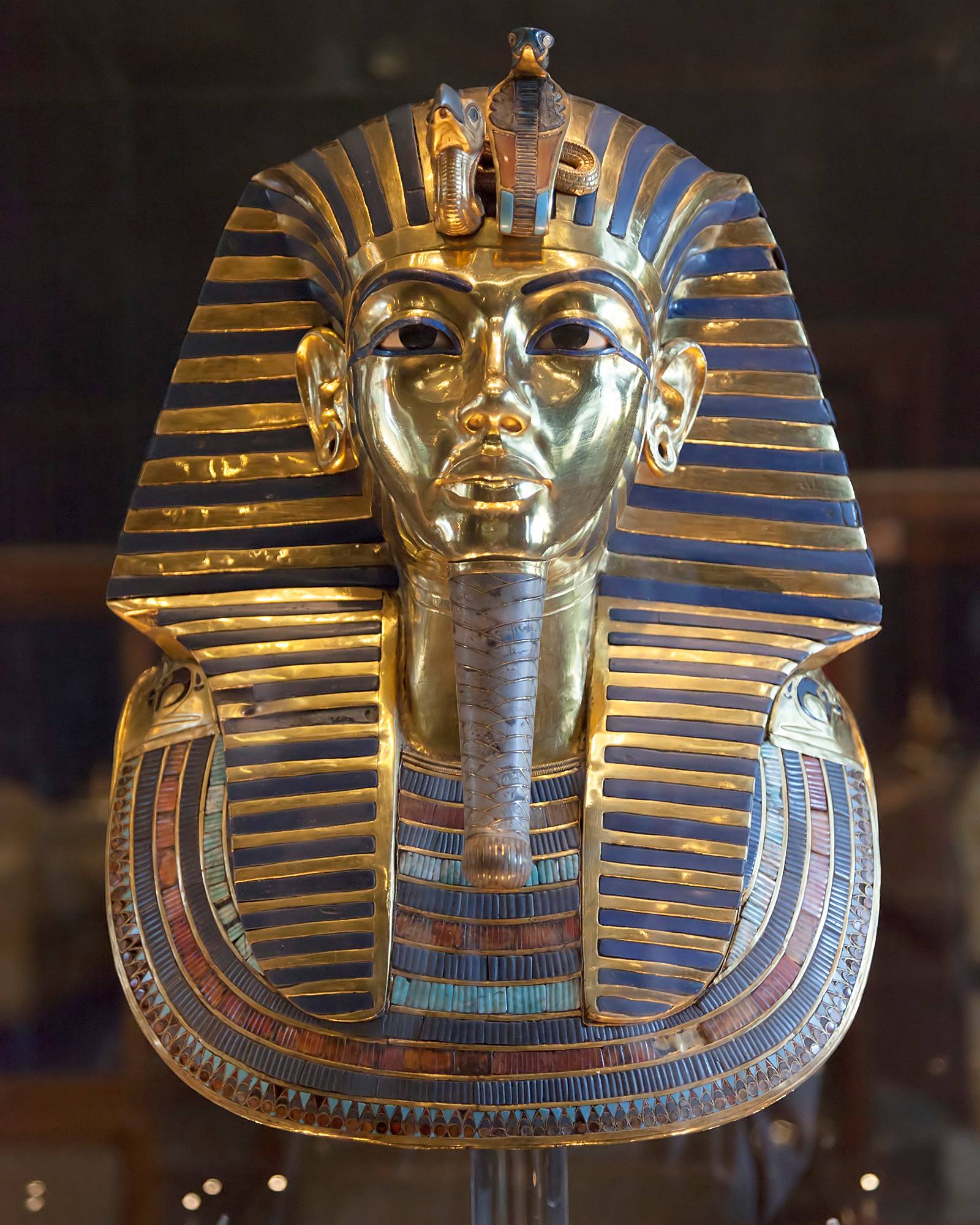Tutankhamun's funerary or death mask made of gold with lapis, carnelian and turquoise inlay