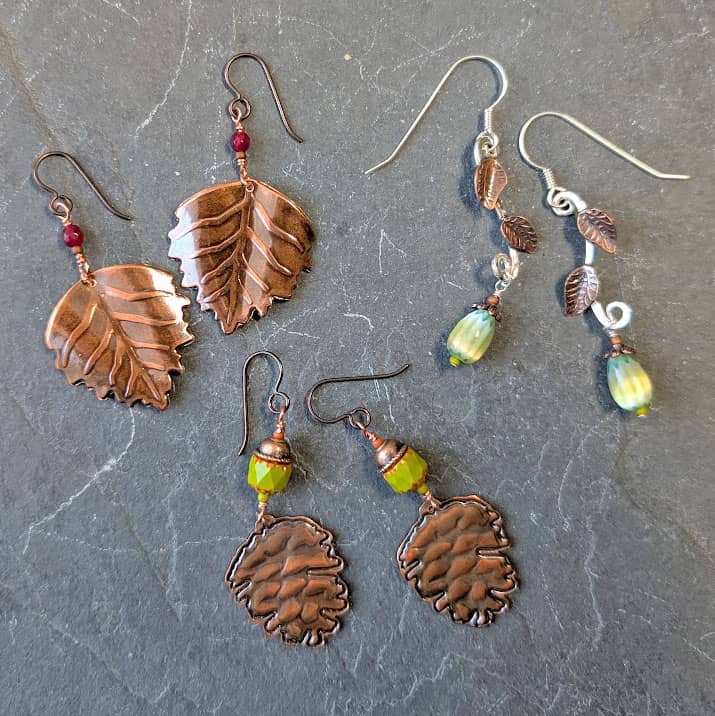 Three pairs of earrings: copper leaves, copper pine cones, silver drops with Czech glass, copper leaves