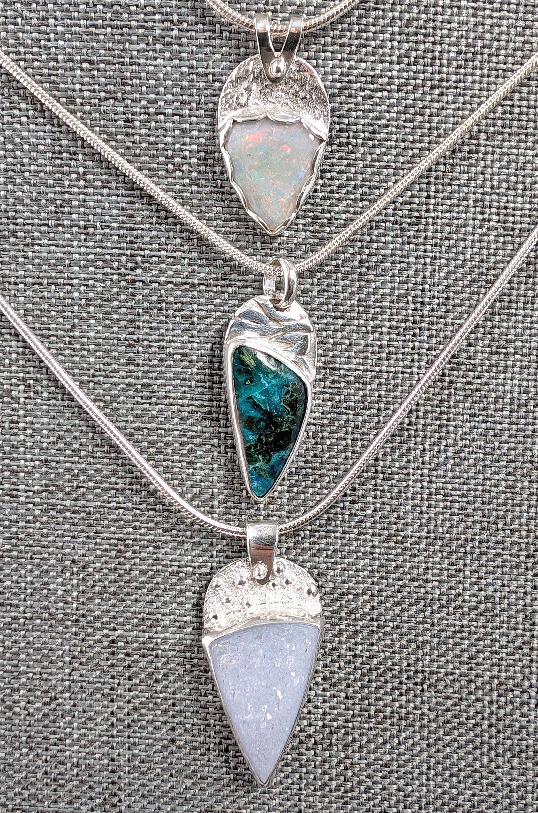 Three small pendants: opal, chrysocolla, agate drusy