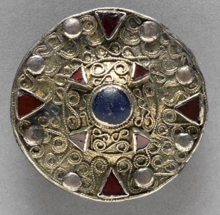 Fillagree silver brooch with red, blue and pink gemstones