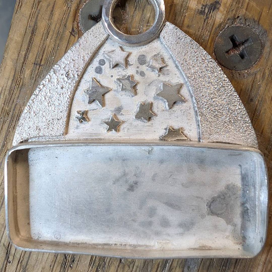 Pendant before being cleaned up after soldering