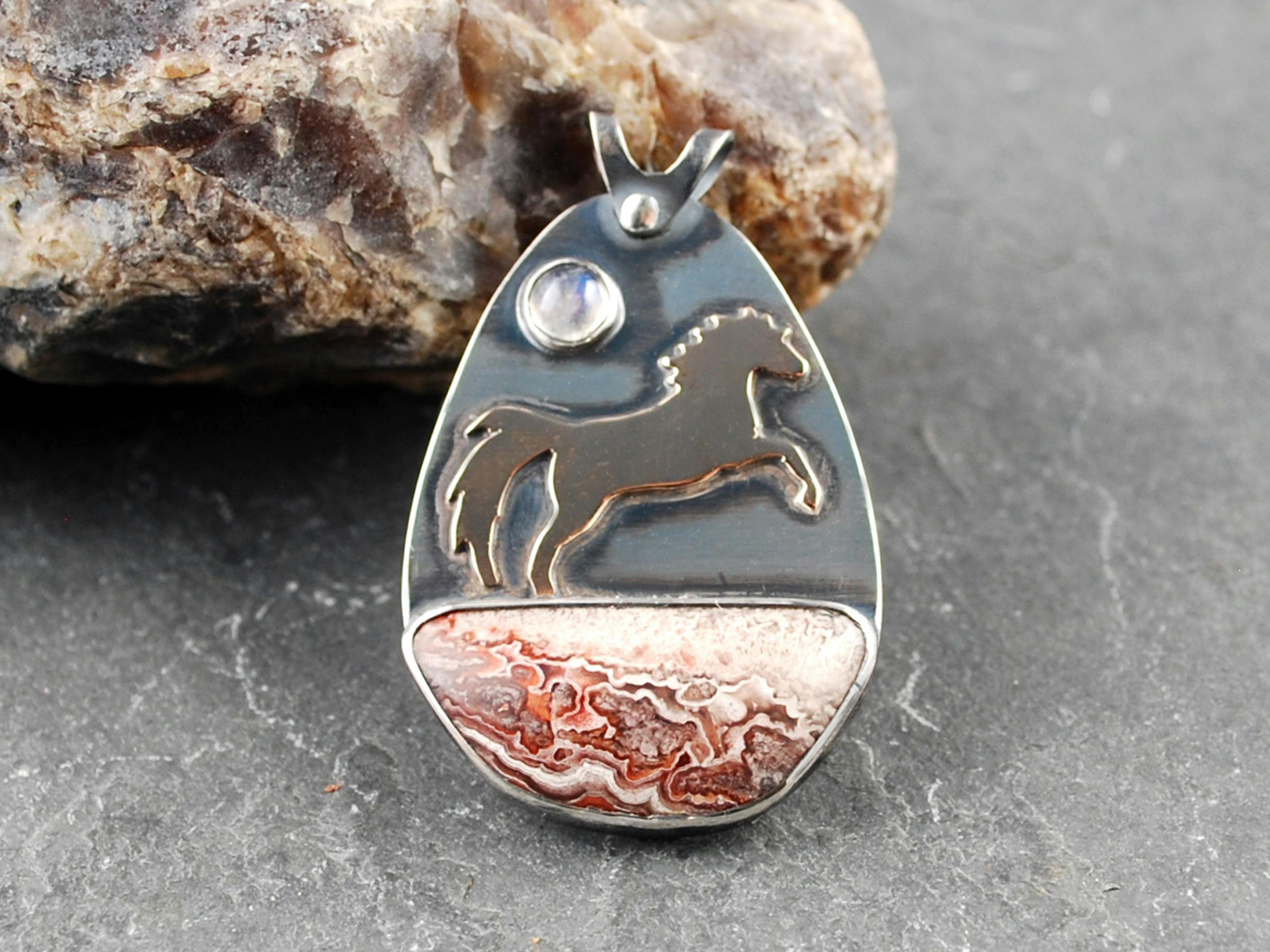 Crazy Lace agate pendant with copper horse and moonstone