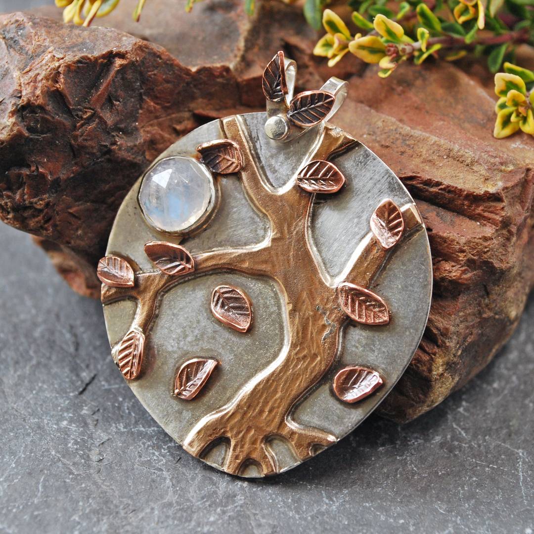 silver pendant with bronze tree, copper leaves and moonstone moon
