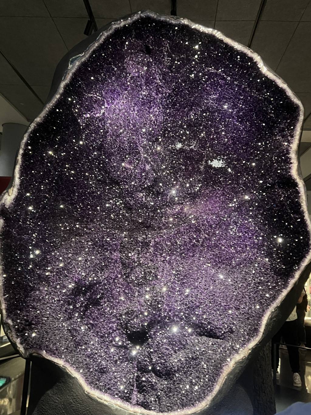 Image of large amethyst geode, cut so the inside crystals are visible