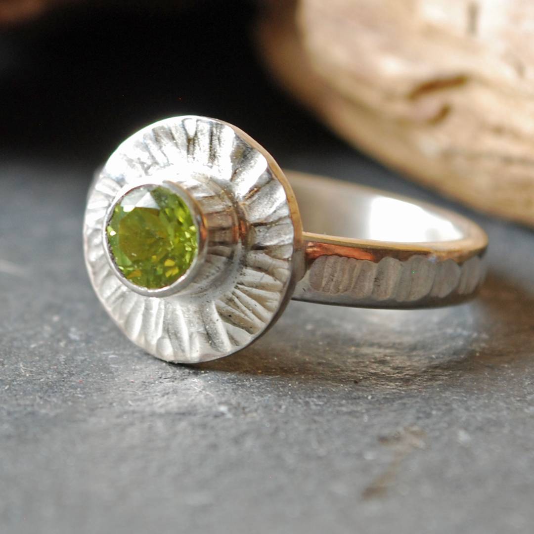 silver ring with peridot