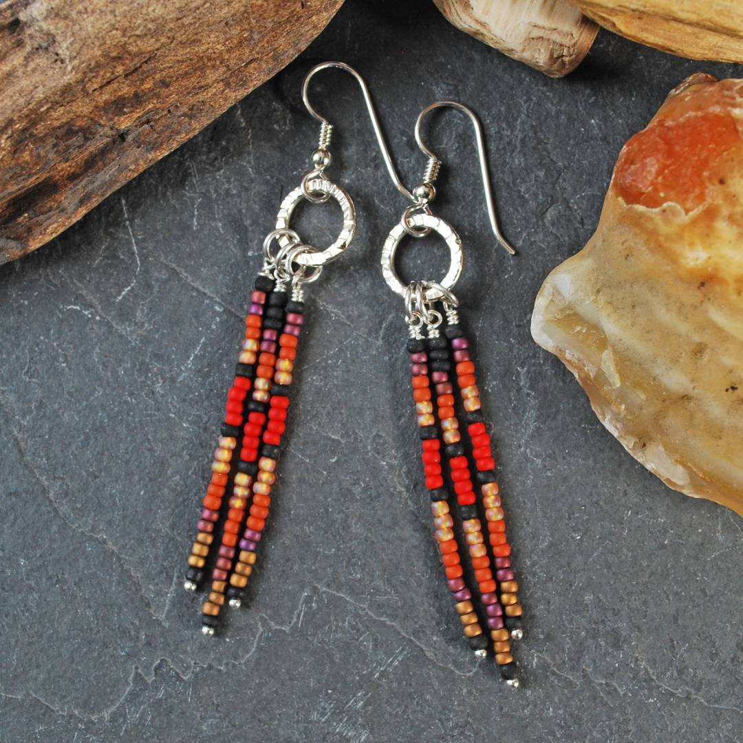 Dangle earrings with red, brown and black seed beads