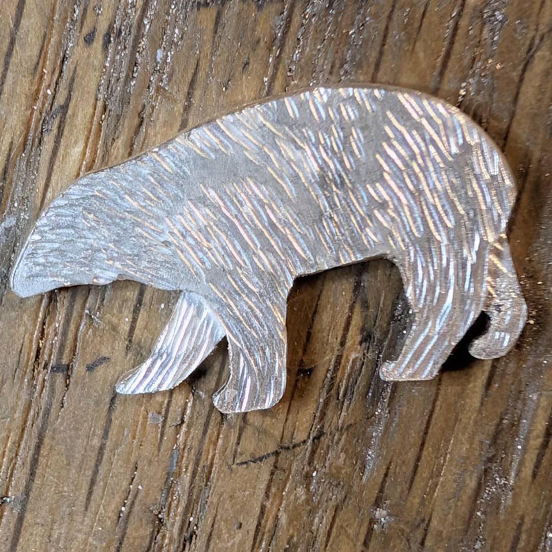 Silver polar bear after soldering and texturing