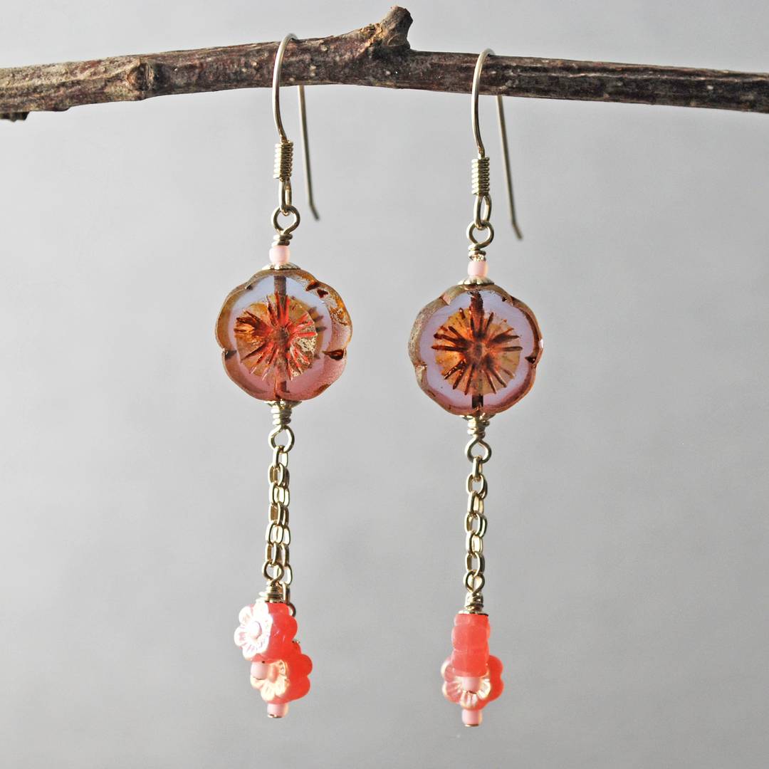 Earrings with pink flower shaped beads