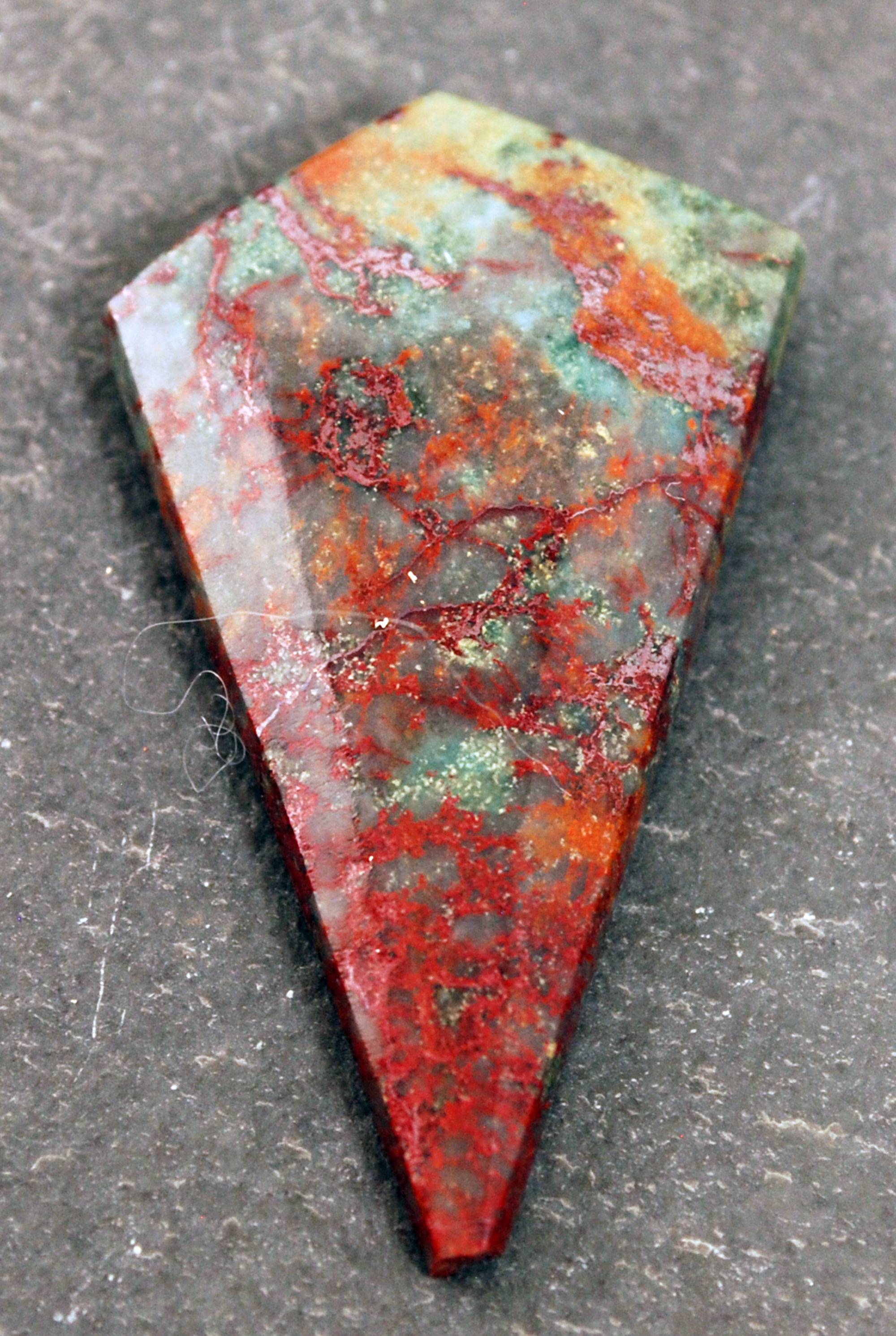 cabochon with cuprite