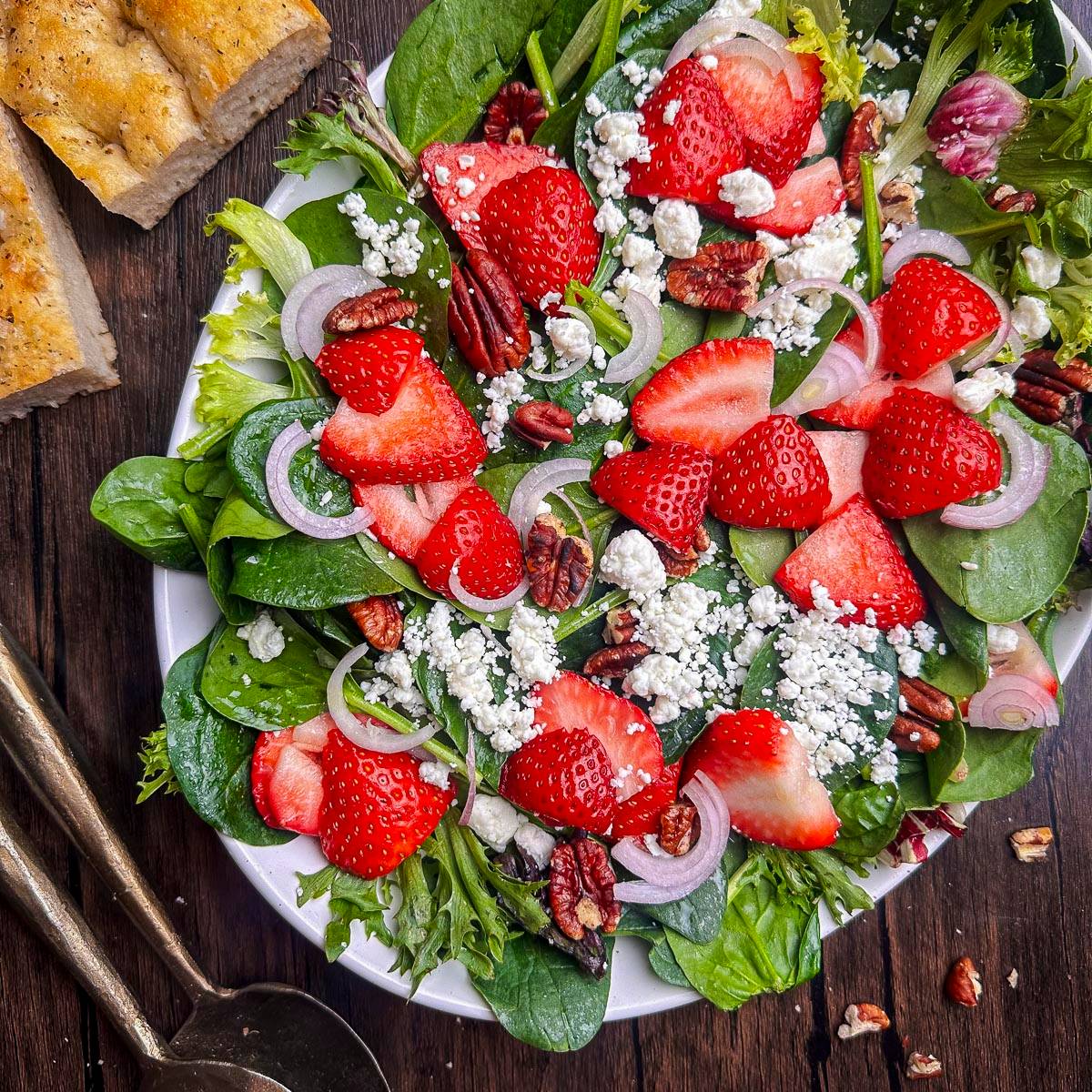 Mixed greens with strawberries and goat cheese.