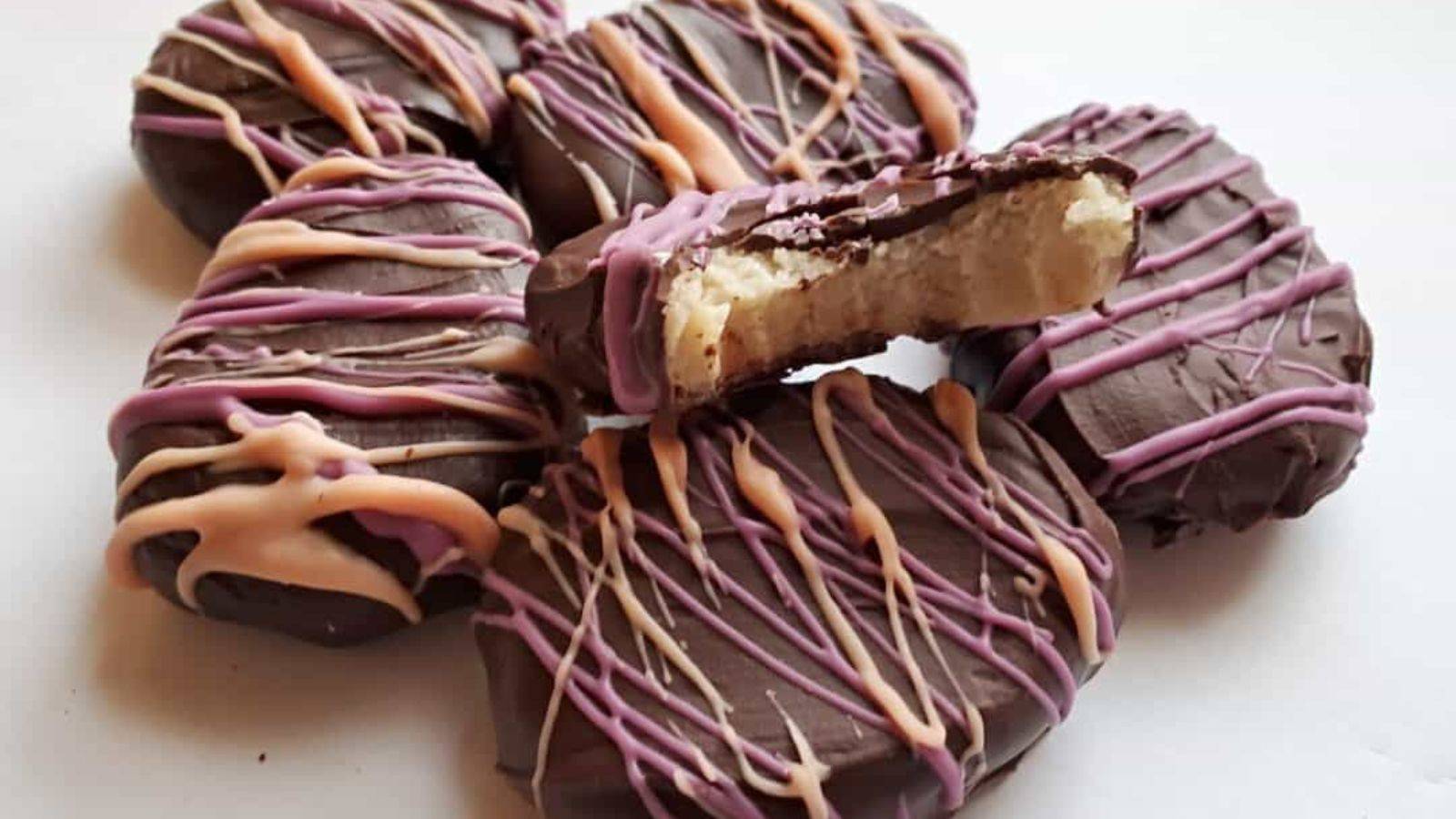 Close up image of Easter truffles with a bite taken from one.