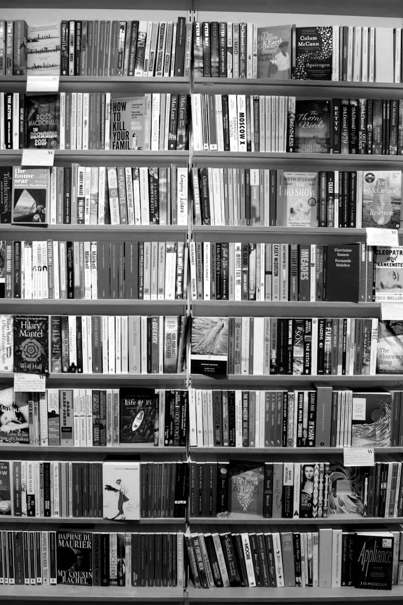 Bookshelves are packed with colorful books.