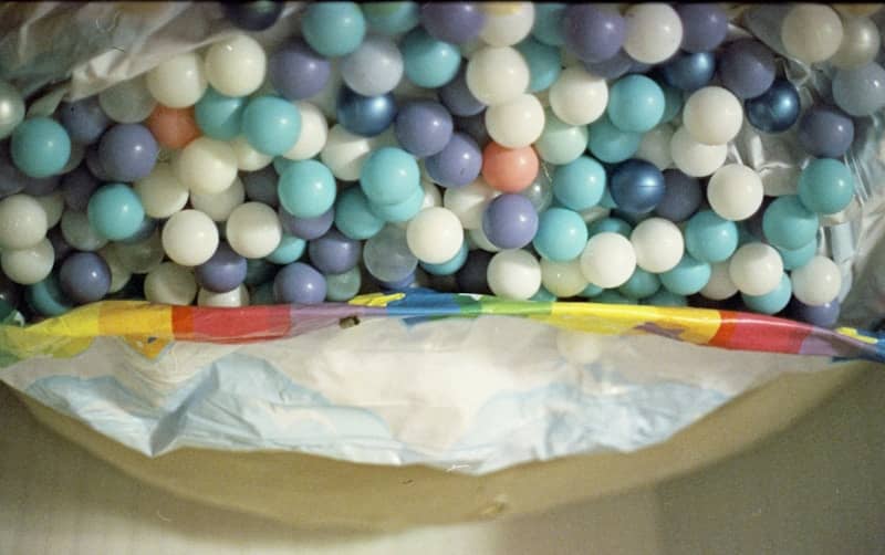 A ball pit filled with colorful plastic balls.