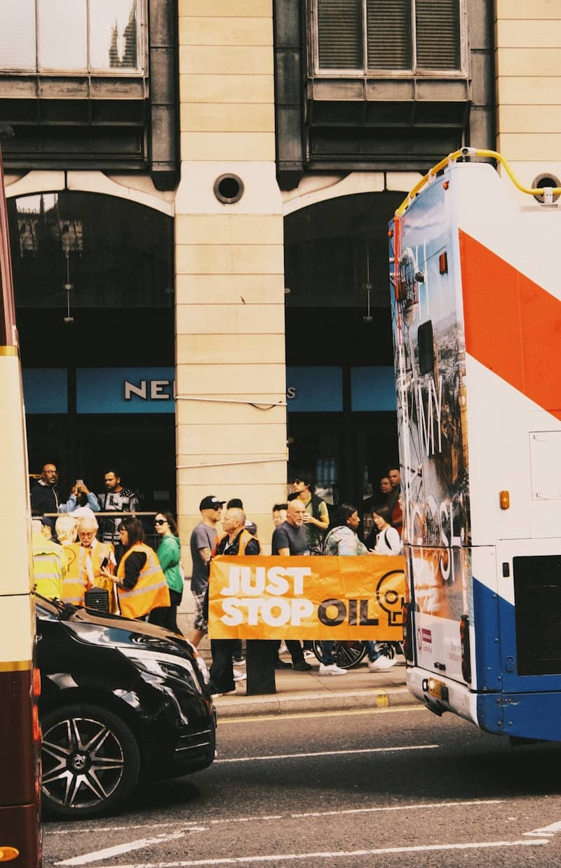 A double decker bus driving down a city street