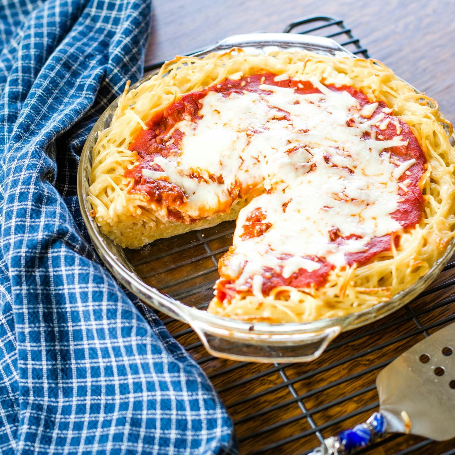 spaghetti pie with slice out of it