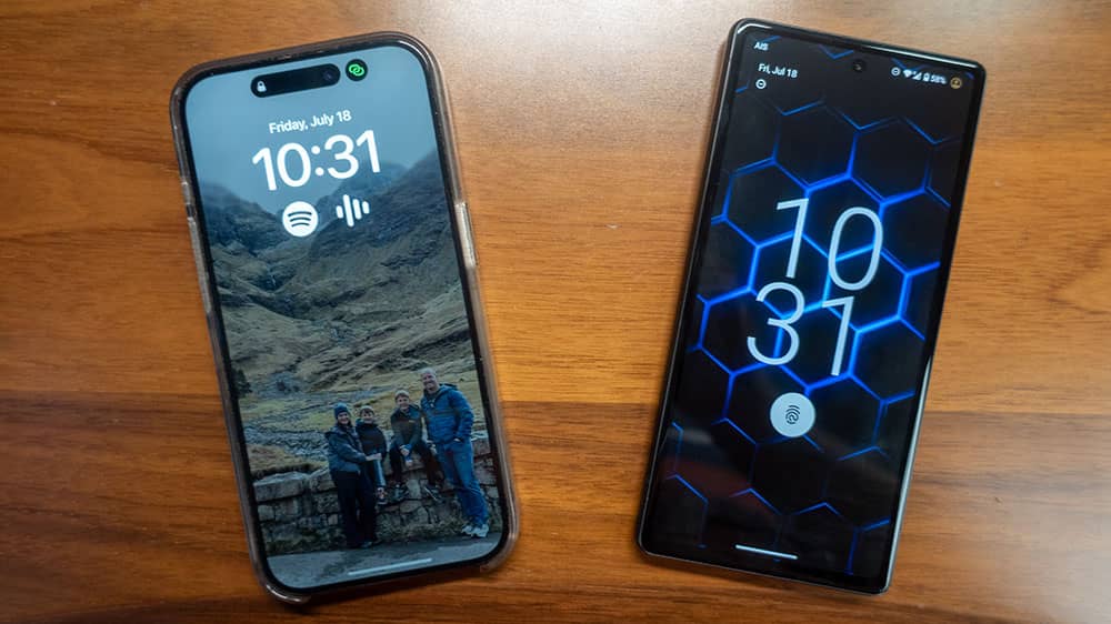 iPhone next to a Pixel GrapheneOS phone