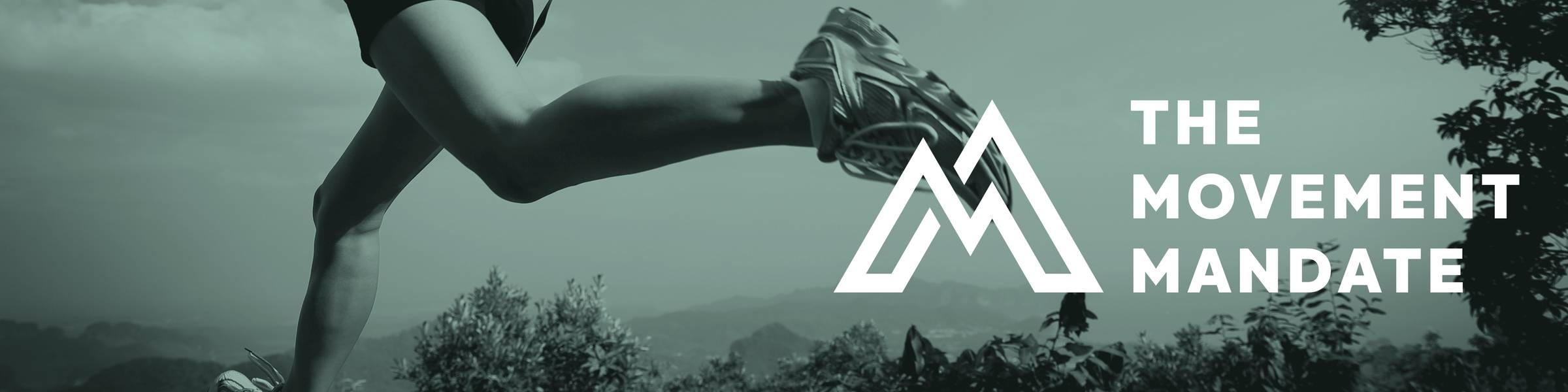 A person running outdoors with a mountainous background, promoting movement and exercise as key to health.
