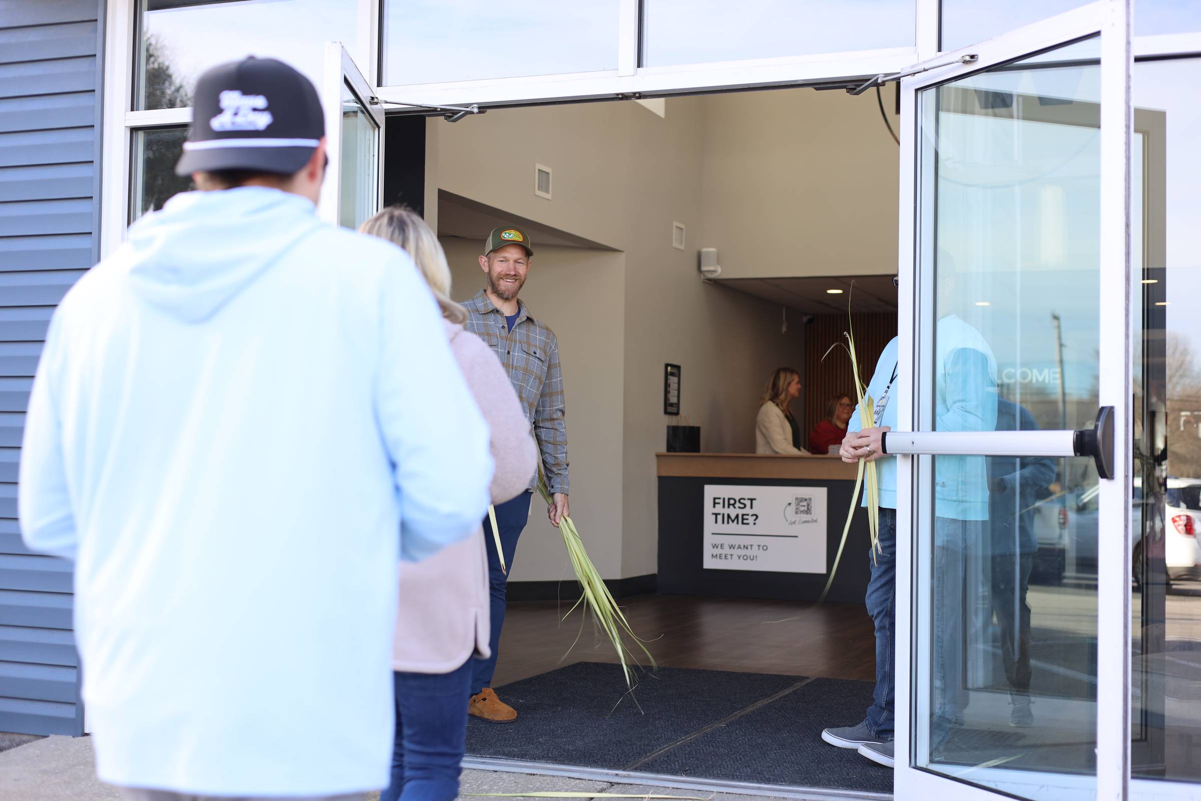 guests walking into church