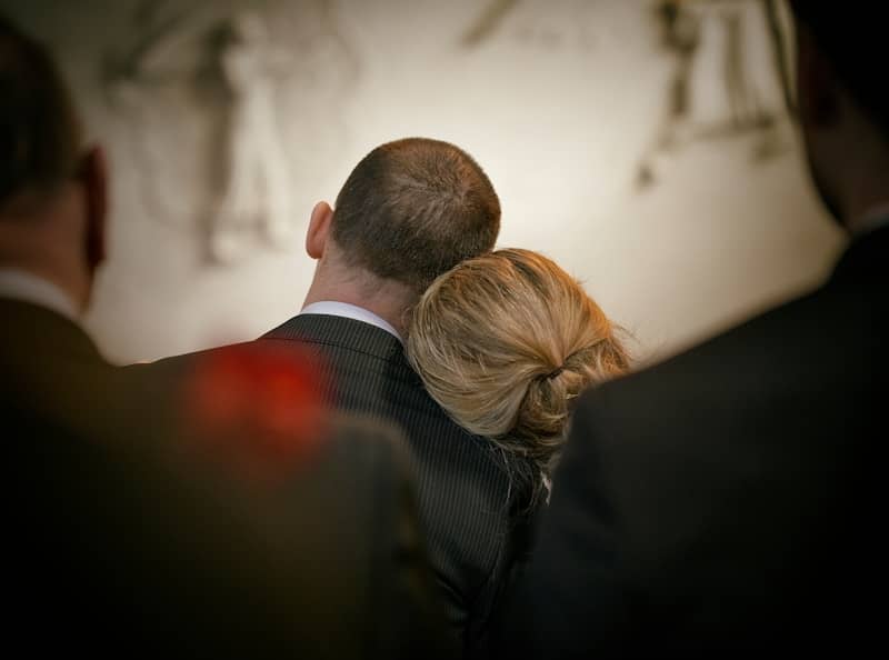 a man and a woman at funeral