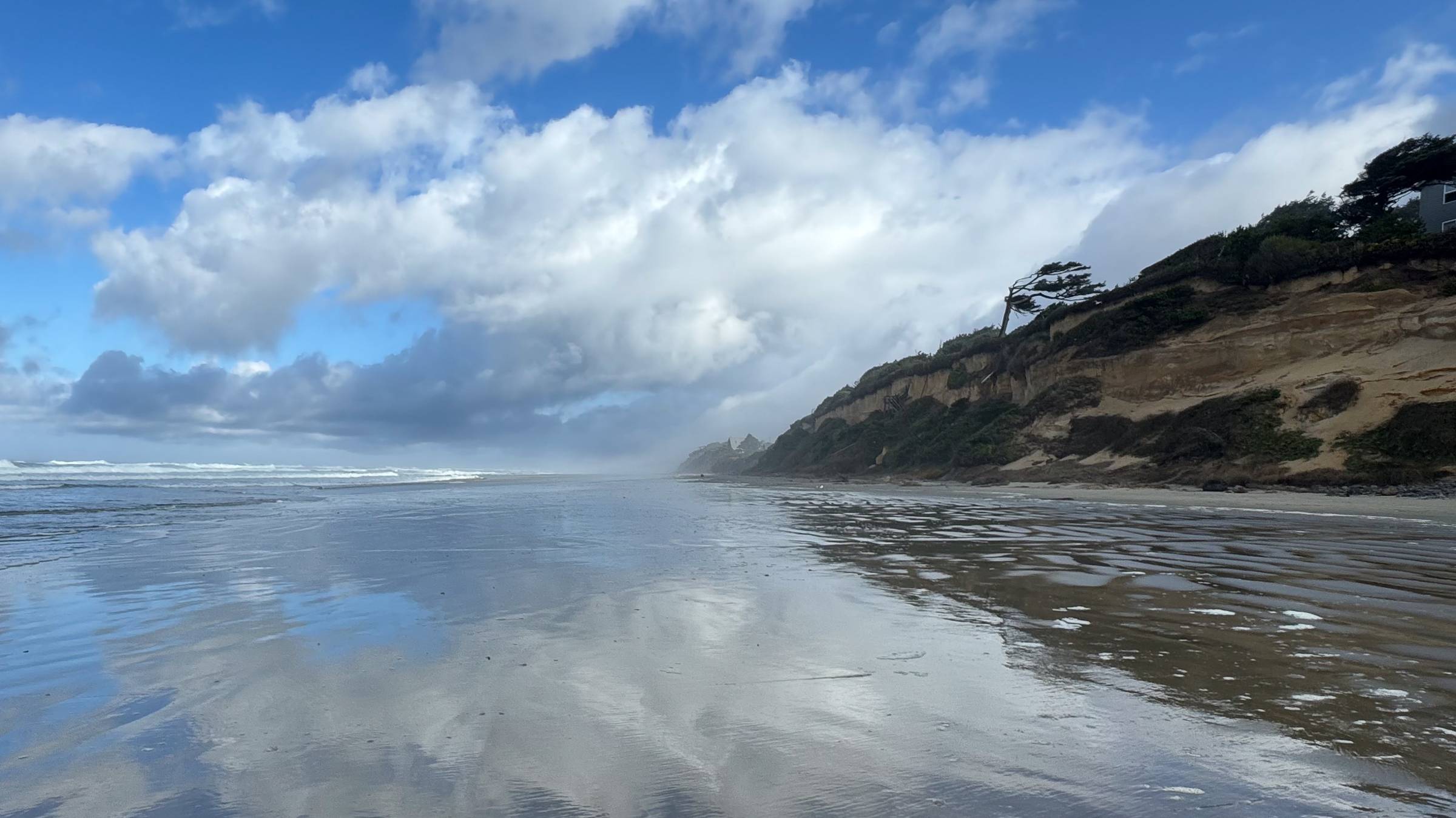 cloud reflections on beach