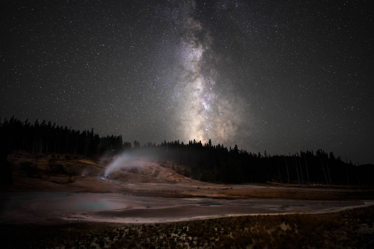 milky way over norris geyser basin in yellowstone