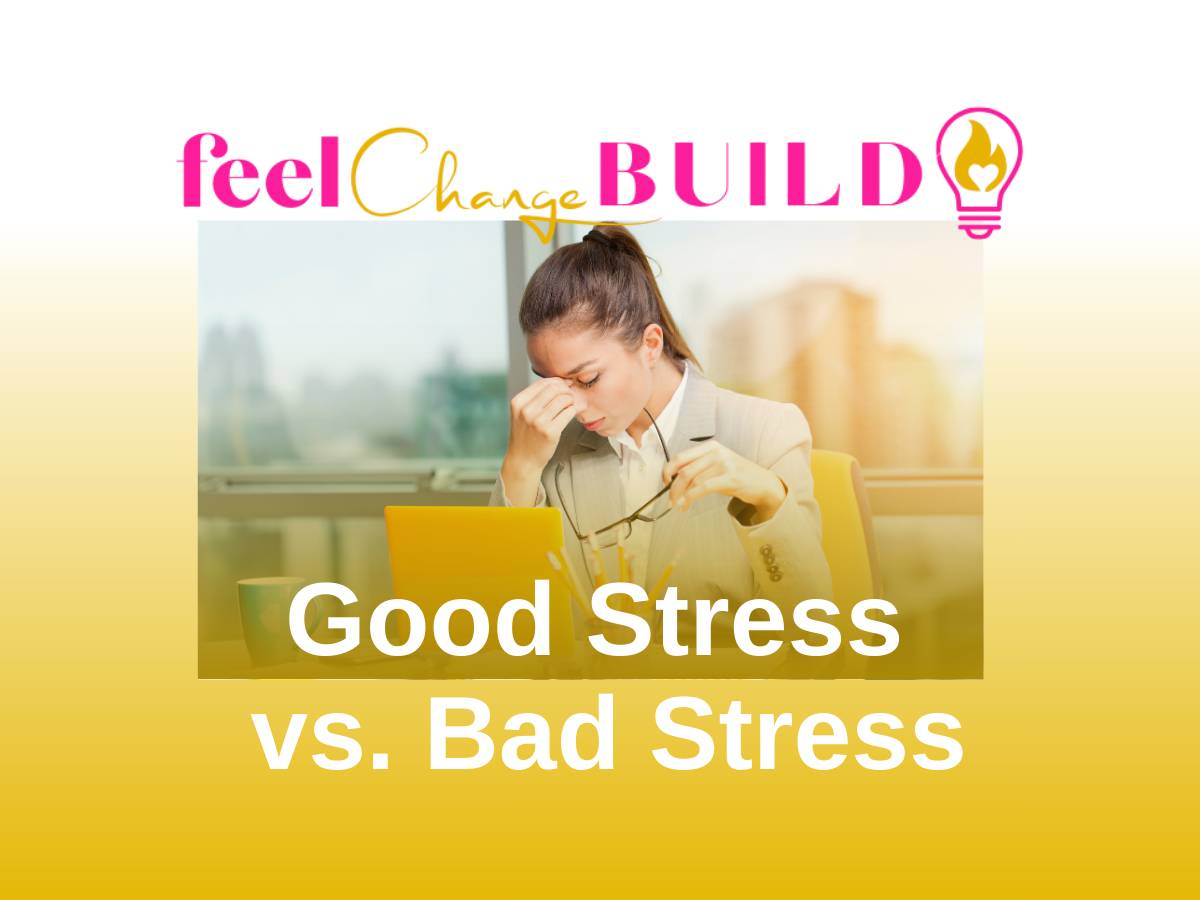 Woman at computer rubbing head