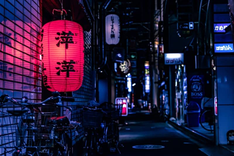Japanese lantern over city bike at nighttime