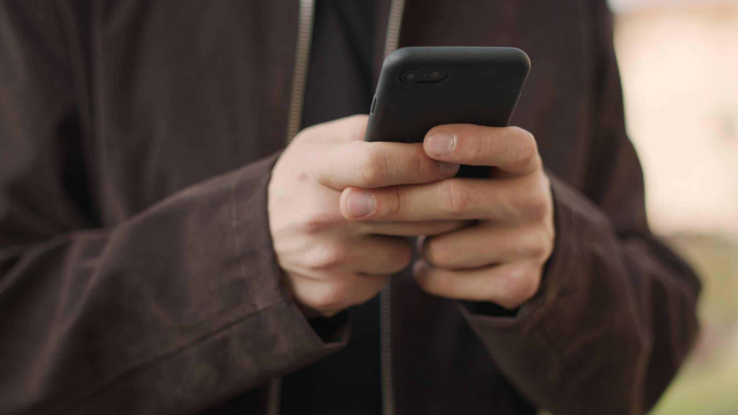 Man using smart phone